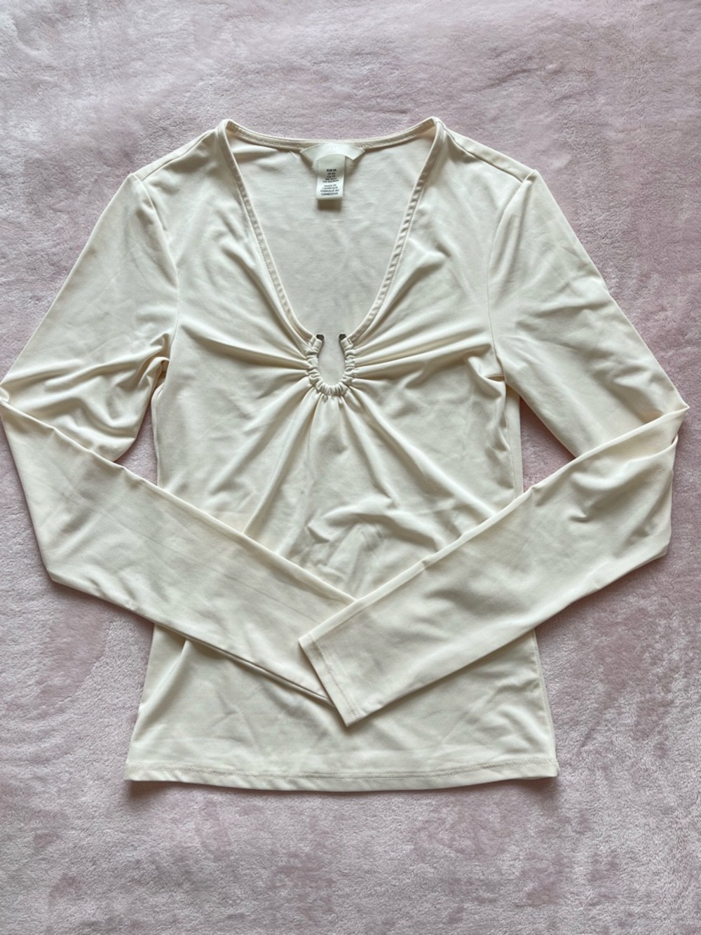Cream top with silver hardware